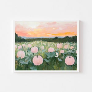 May include: A painting of a field of pink pumpkins at sunset. The pumpkins are surrounded by green leaves and grass. The sky is a soft orange and pink.