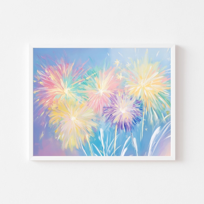 May include: A framed art print featuring a colorful fireworks display. The artwork showcases vibrant bursts of yellow, pink, purple, and teal against a light blue background. The painting style is impressionistic, with visible brushstrokes.