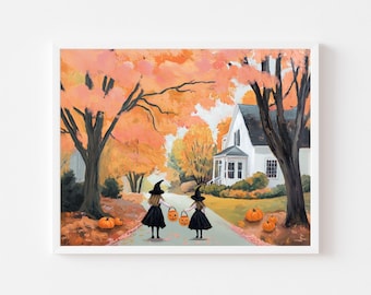 May include: A framed print depicts a Halloween scene. Two figures in black dresses and witch hats walk down a path, carrying jack-o'-lantern buckets. The path leads to a white house with a black roof, surrounded by orange autumn trees and pumpkins.
