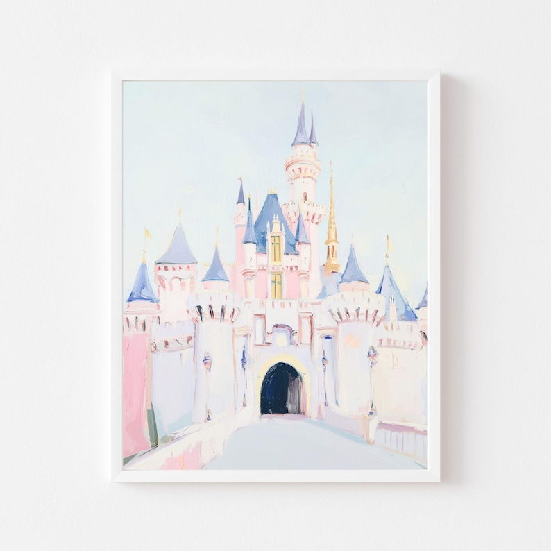 May include: A framed watercolor painting of a fairytale castle. The castle features pink, blue, and white hues, with multiple turrets and spires. The artwork is set against a light blue sky, creating a whimsical and dreamy aesthetic.