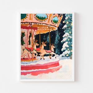 May include: A framed painting of a carousel with reindeer in a snowy forest. The carousel has a pink and orange canopy with lights. The reindeer have red and green saddle blankets. The background shows a dark blue night sky and snow-covered trees.