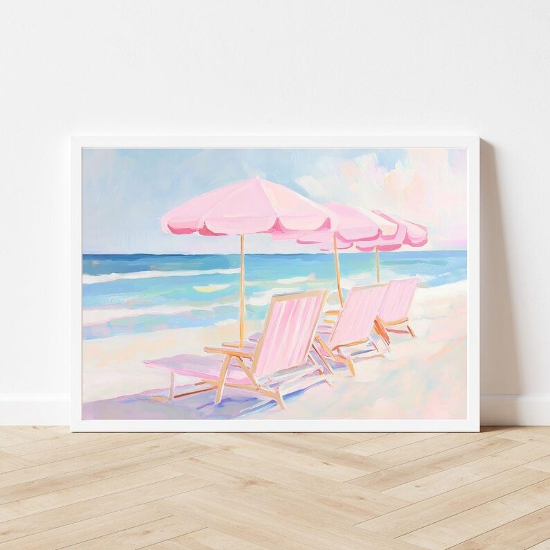 May include: A painting of a beach scene with three pink lounge chairs under pink umbrellas. The chairs are facing the ocean, which is painted in shades of blue and green. The sand is white and the sky is a light blue with white clouds.