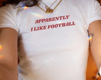Apparently I Like Football Baby Tee Y2K Womens Fitted Tee Funny Baby Tee Sarcastic Sports Tee Football Meme Shirt Gift For Best Friend