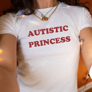 Y2k Baby Tee In White With Funny Red Quote "Autistic Princess".