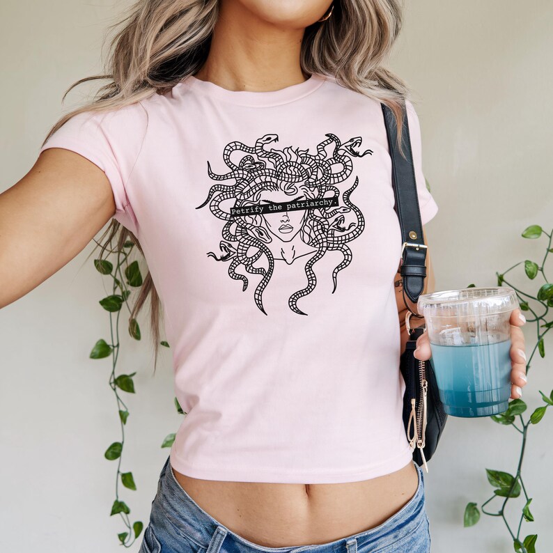 Petrify The Patriarchy Feminist Baby Tee, Pink Y2K Aesthetic Graphic Tee with Medusa Illustration, Greek Mythology Women’s Shirt, Gift for Her.