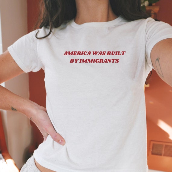 America Was Built By Immigrants Baby Tee Pro-Immigration Shirt Women's Baby Tee Political Activist Tee Anti-Racism Equal Rights Gift for Her