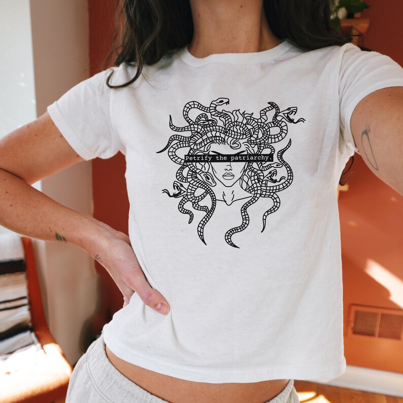 Petrify The Patriarchy Y2K Baby Tee, White Feminist Baby Tee with Medusa Graphic, Greek Mythology Aesthetic Women’s Shirt, Gift for Her.