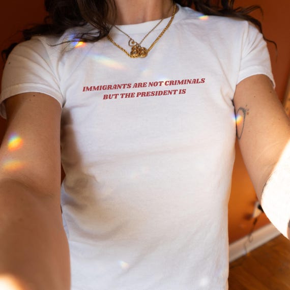 Pro Immigration Shirt Immigrants Are Not Criminals But The President Is Baby Tee Anti Trump Shirt Anti Fascism Shirt Activist Protest Tee