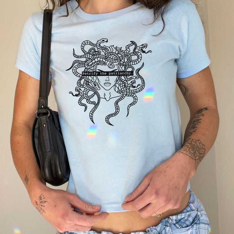 Petrify The Patriarchy Y2K Baby Tee, Light Blue Feminist Graphic Tee with Medusa Design, Greek Mythology Aesthetic Baby Tee, Gift for Women.