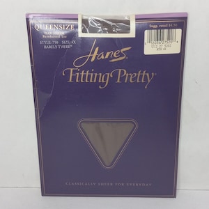 May include: A pack of Hanes 'Fitting Pretty' sheer tights in a size 4X. The packaging is purple with a brown triangle cutout showing the tights. The text 'Sugg. retail £4.50' is printed on the pack.