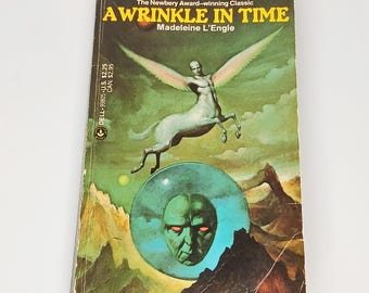 Una arruga en el tiempo, de Madeleine L'Engle, 1983, edición de bolsillo, novela clásica.