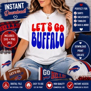 May include: A white t-shirt featuring the red and blue text LET'S GO BUFFALO in a wavy font. The design is displayed alongside a football, a pennant, and a helmet, all decorated with the same text and a blue buffalo logo on a white background.
