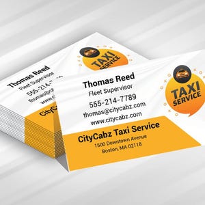 May include: A stack of white business cards with a yellow and orange design. The cards feature the text "Thomas Reed, Fleet Supervisor" and "CityCabz Taxi Service." The logo includes a taxi icon.