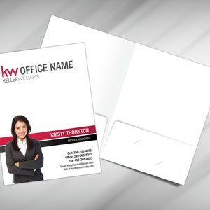 May include: A red and black real estate business card with the Keller Williams logo and the text "kw OFFICE NAME" at the top. The card features a photo of a woman with her arms crossed, and her name, "KRISTY THORNTON", is printed below the photo. The card includes contact information for the woman, including her cell phone number, office phone number, fax number, and email address.