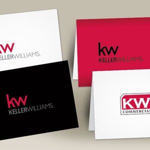 May include: Four different business card designs featuring the Keller Williams logo. The first card is white with a red logo. The second card is red with a black logo. The third card is black with a red logo. The fourth card is white with a red and black logo that says "KW Commercial".