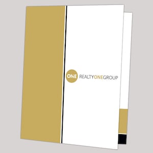 May include: A gold and black folder with the text "REALTYONEGROUP" and a circle with the word "ONE" inside.