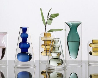 Vases créatifs aux couleurs bonbons : verre coloré de style nordique, vases à fleurs hydroponiques modernes et transparents.