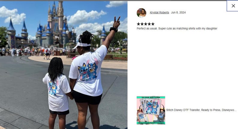 a couple of people that are standing in front of a castle