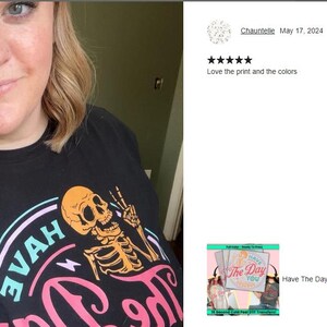 a woman wearing a black shirt with a skeleton on it
