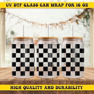 May include: Three 16 ounce glass can wraps with a black and white checkered pattern. The wraps are designed to be used on glass cans with a straw.