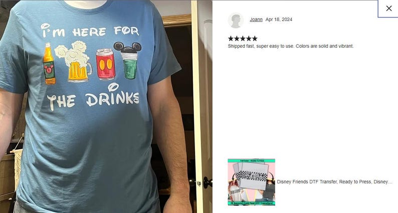a man wearing a t - shirt that says i'm here for the drinks
