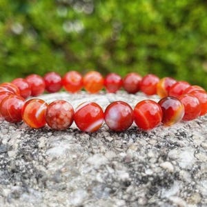 Carnelian crystal bracelet with 10mm beads for confidence and positivity