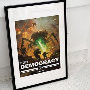 May include: A framed poster featuring a dark, action-packed scene of soldiers battling a large, insect-like creature emitting green energy. The text FOR DEMOCRACY is printed in bold white letters at the bottom, accompanied by a globe icon and five stars.