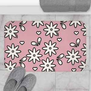 Tapis de bain à fleurs roses et blanches avec de jolies fleurs blanches et roses pour votre salle de bain