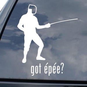 May include: White vinyl decal of a fencing figure with the text "got épée?" on a car window. The figure is in a fencing stance, holding a foil. The decal is a silhouette, with the text in a sans-serif font.