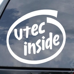 May include: White vinyl decal with the text "utec inside" in a stylized oval design, applied to a car window. The decal is a parody of the Intel logo.