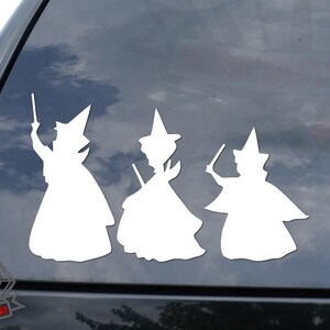 May include: White silhouette vinyl decal of three fairies with wands, perfect for a car window or other smooth surface.