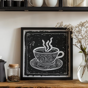 May include: Black and white framed print of a stylized illustration of a coffee cup with steam rising from it. The cup is decorated with swirls and dots.