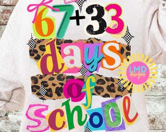 May include: A white sweatshirt with the text "67 + 33 days of school" in colorful, playful lettering. The design includes a leopard print section and a pink "original" stamp. The sweatshirt has long sleeves.