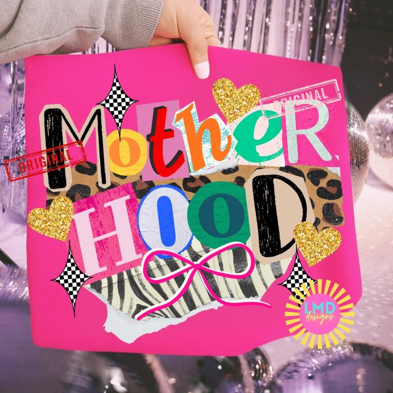 May include: A hot pink graphic design featuring the word "Motherhood" in a collage style with various patterns and colors. Includes gold glitter hearts, a bow, and the word "Original" stamped on the design.