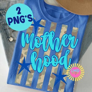 May include: Blue t-shirt with the word "Motherhood" in a script font, accented with blue stars and camouflage stripes. The shirt also has the text "2 PNG'S" in a blue circle and a logo in a yellow circle.