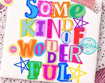 May include: White t-shirt with the words "SOME KIND OF WONDERFUL" in colorful, block letters. The design includes stars and a circular stamp that says "THE ORIGINAL 100%." A pink hair clip and a decorative pink basket are in the background.