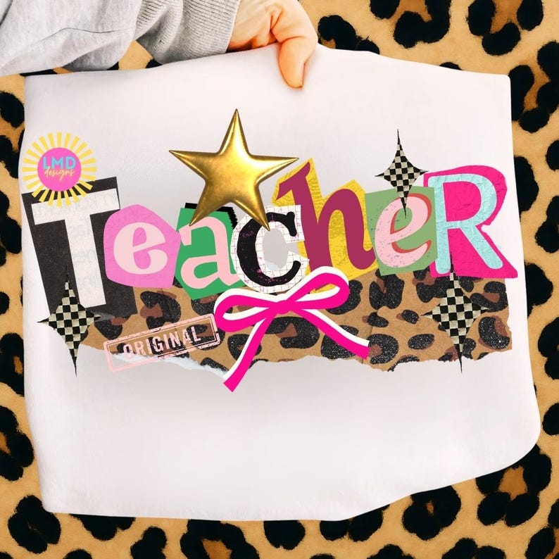 May include: A white sheet with the word "Teacher" in colorful, layered letters, a gold star, and a pink bow. The word "ORIGINAL" is printed on a small rectangular label. The background is a leopard print.