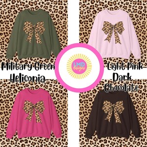 May include: Four sweatshirts in military green, light pink, hot pink, and dark chocolate. Each sweatshirt features a large bow with a leopard print design. The text on the image reads "Military Green", "Light Pink", "Dark Chocolate", and "Heliconia".