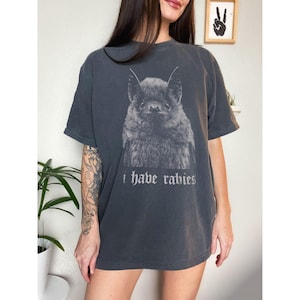I Have Rabies shirt,
Bat t-shirt,
Funny sarcasm tee,
Unhinged Meme,
Weird Dark Humor,
Grunge Y2k shirt,
rabies hoodie,
i have rabies hoodie,
rabies sweatshirt,
i have rabies tee,
i have rabies tshirt,
i have rabies top,
possum meme