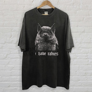 I Have Rabies shirt,
Bat t-shirt,
Funny sarcasm tee,
Unhinged Meme,
Weird Dark Humor,
Grunge Y2k shirt,
rabies hoodie,
i have rabies hoodie,
rabies sweatshirt,
i have rabies tee,
i have rabies tshirt,
i have rabies top,
possum meme
