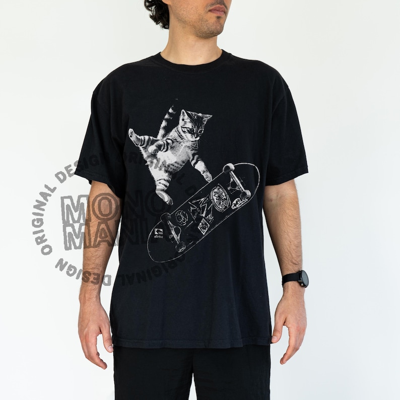 skateboarding cat shirt, retro cat graphic tee, vintage kitten tshirt, punk streetwear top, funny cat skate tee, oversized unisex shirt, cool beer cat tshirt, y2k skater aesthetic, 90s retro cat shirt, grunge coquette tee, rockstar gf cat top, mori kei skate shirt, streetwear cat graphic