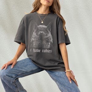 I Have Rabies shirt,
Bat t-shirt,
Funny sarcasm tee,
Unhinged Meme,
Weird Dark Humor,
Grunge Y2k shirt,
rabies hoodie,
i have rabies hoodie,
rabies sweatshirt,
i have rabies tee,
i have rabies tshirt,
i have rabies top,
possum meme