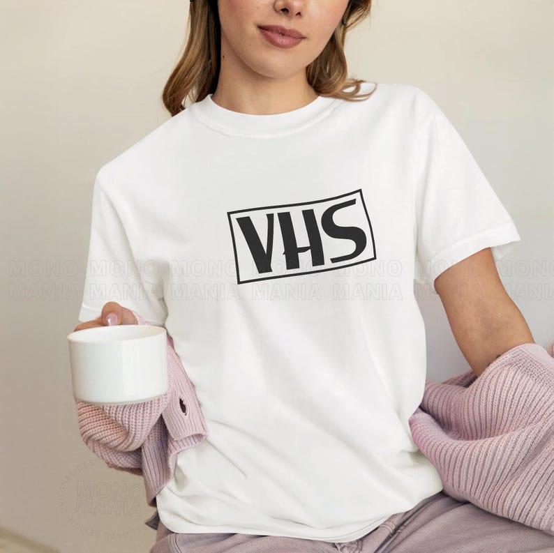 vhs shirt,
nostalgic shirt,
nostalgic tee,
90s shirt,
80s shirt,
movie fan gift,
movie fan shirt,
horror movie shirt,
vintage shirt,
cinephile hoodie,
y2k shirt,
retro movie shirt,
Retro Video Betamax