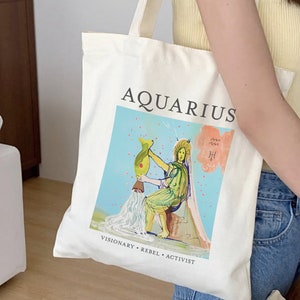 Torba z płótna bawełnianego ze znakiem zodiaku, spersonalizowany prezent urodzinowy, prezent dla miłośnika sztuki, surrealistyczna torba na książki