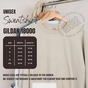 May include: A beige unisex Gildan 18000 sweatshirt hanging on a wooden hanger. The image includes a size chart with measurements in inches. The text reads "UNISEX Sweatshirt" and "MONO MANIA ORIGINAL DESIGN".