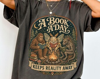 Comfort Colors® A Book A Day Keeps Reality Away Shirt, Cryptid Book Lover Tee, Bigfoot Mothman Reading Shirt, Spooky Bookworm Shirt, Reading