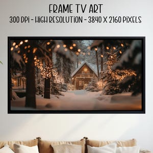 May include: A framed digital art print featuring a winter scene with a snow-covered cabin and trees illuminated by warm lights. The text at the top reads "FRAME TV ART" and details the resolution. The artwork is displayed in a black frame.