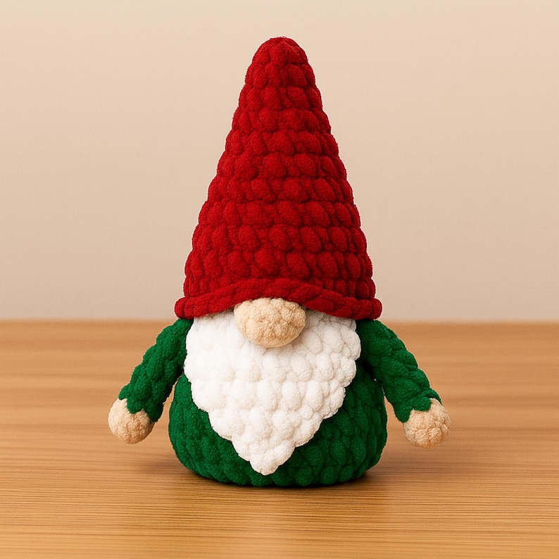 May include: A festive Christmas gnome with a red conical hat, white beard, and green body. The gnome has small arms and a round nose. The gnome is made of a soft, textured material, perfect for holiday decor.