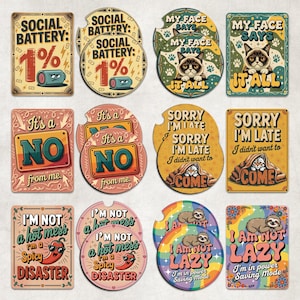 May include: A collection of car coasters and rectangular signs with humorous phrases. Designs include "Social Battery 1%", a grumpy cat, "It's a NO", "Sorry I'm Late", a sloth, and "I'm Not a Hot Mess".