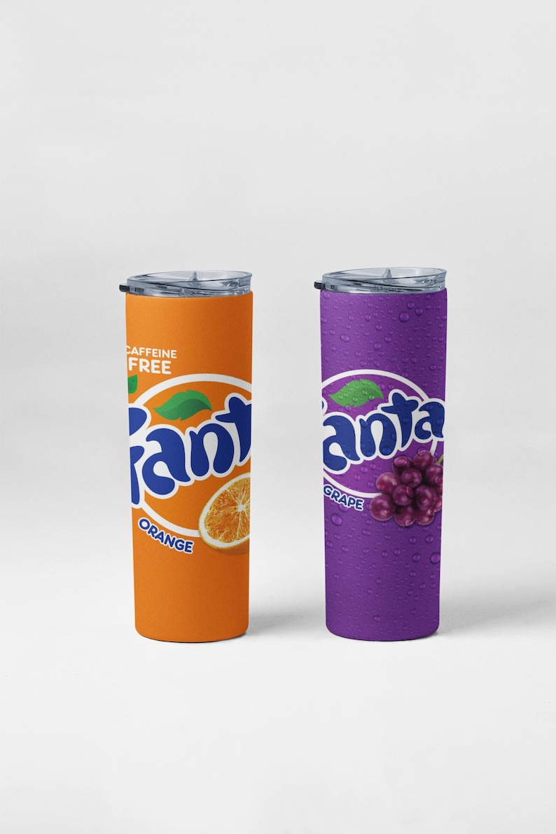 May include: Two insulated tumblers, one orange with "Fanta Orange" and a slice of orange, the other purple with "Fanta Grape" and a cluster of grapes. Both have clear lids and are caffeine-free.